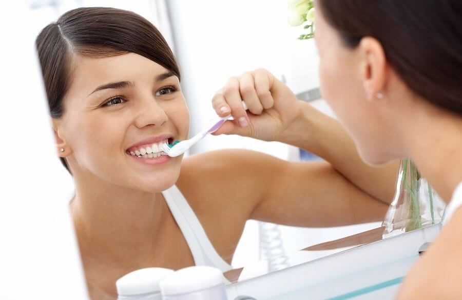 сколько нужно чистить зубы в день фото